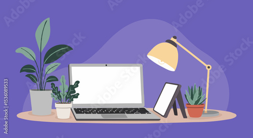 Workplace desk setup with laptop and plants