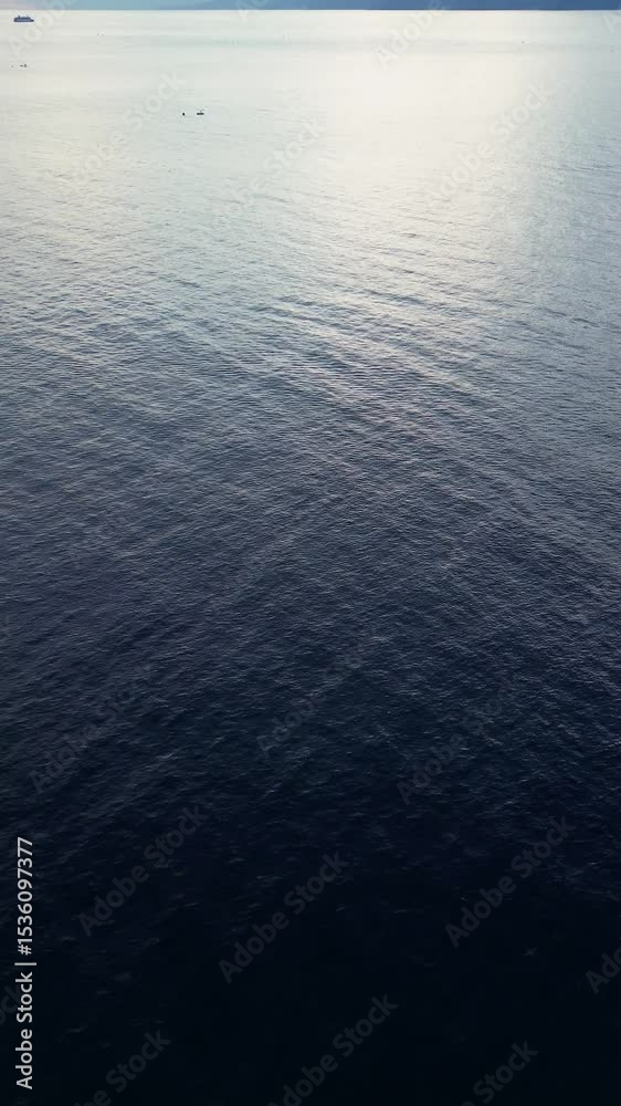 Calm Seascape with Cloudy Sky at Dusk Calm Seascape with Cloudy Sky at Dusk