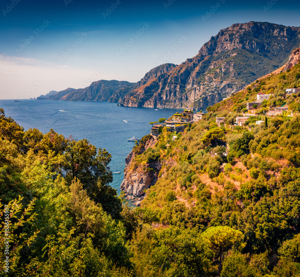 Fototapeta premium Spectacular morning scene of popular tourist destination - San Pietro di Positano. Impressive summer view of Mediterranean coast of west Italy, Europe. Traveling concept background.