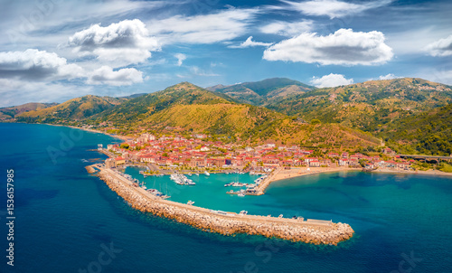 Fototapeta Naklejka Na Ścianę i Meble -  Incredible summer view from flying drone of Acciaroli port. Spectacular morning scene of Mediterraneanm coast of Italy, Europe. Traveling concept background.