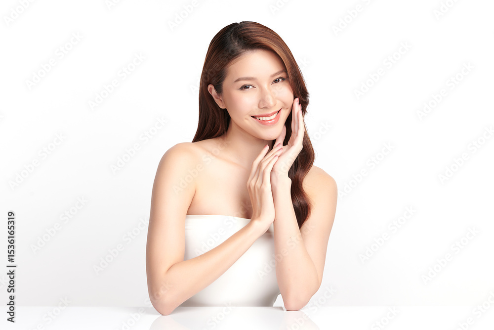 A beautiful young Asian woman with clean, fresh skin against a white background. Skincare, facial treatment, cosmetology, beauty, and spa. An elegant portrait of an Asian woman. A beautiful young Asian woman with clean, fresh skin against a white background. Skincare, facial treatment, cosmetology, beauty, and spa. An elegant portrait of an Asian woman.