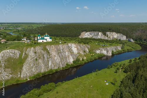 temple on a high cliff above the river