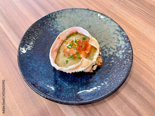 Salmon Kani Miso, famous delicious Japanese food. Kani Miso is the nickname given to the rich, complex paste made from boiling the non-meaty innards of fresh crab