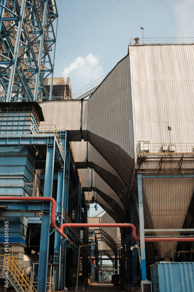 Naklejka premium Vast Industrial Plant with Blue Structures