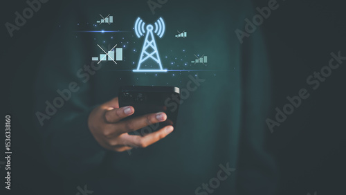 The mobile network is not working. Hand holding a smartphone with glowing signal tower and disconnected icons, illustrating network issues, weak signal, or no connection concept.