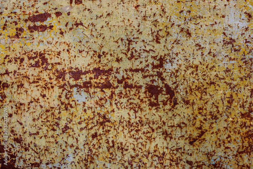 Rusty metal surface with paint chipping in - full-frame background and texture Rusty metal surface with paint chipping in - full-frame background and texture