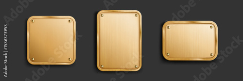 Gold metal tag collection with screws on dark background. Shiny brass plates in square and rectangular shapes for signage. Premium metallic nameplates with mounting hardware for branding.