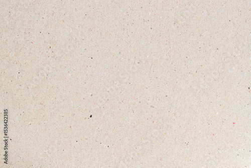Recycled paper background with soft fibers and subtle specks in light tone. Eco-friendly neutral texture for natural designs. Concept of recycling, minimal style, raw paper surface