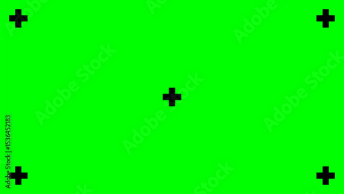 Vibrant green screen background with essential black tracking markers, ready for chroma key compositing. Ideal for video production, special effects, or digital display replacement