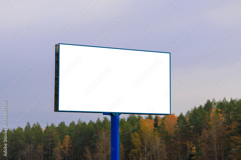 Obraz premium Advertising billboard along the road in the city. Background for design. 