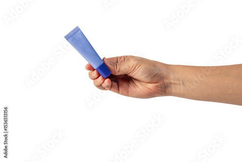 Purple packaging for cream, sunscreen or serum in hand on transparent background.