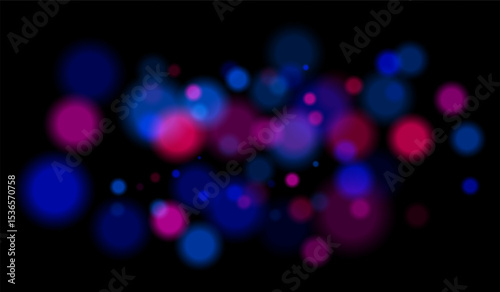 Multicolored blurred bokeh particles with violet, blue, pink hues floating on black background, creating festive or dreamy abstract composition.