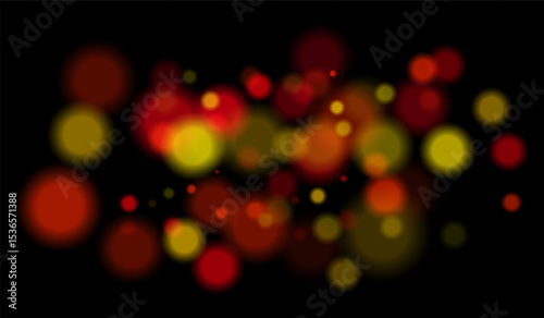 Multicolored blurred bokeh particles with violet, blue, pink hues floating on black background, creating festive or dreamy abstract composition.