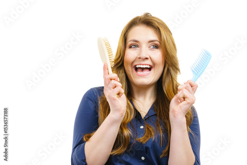 Girl long hair with comb brush
