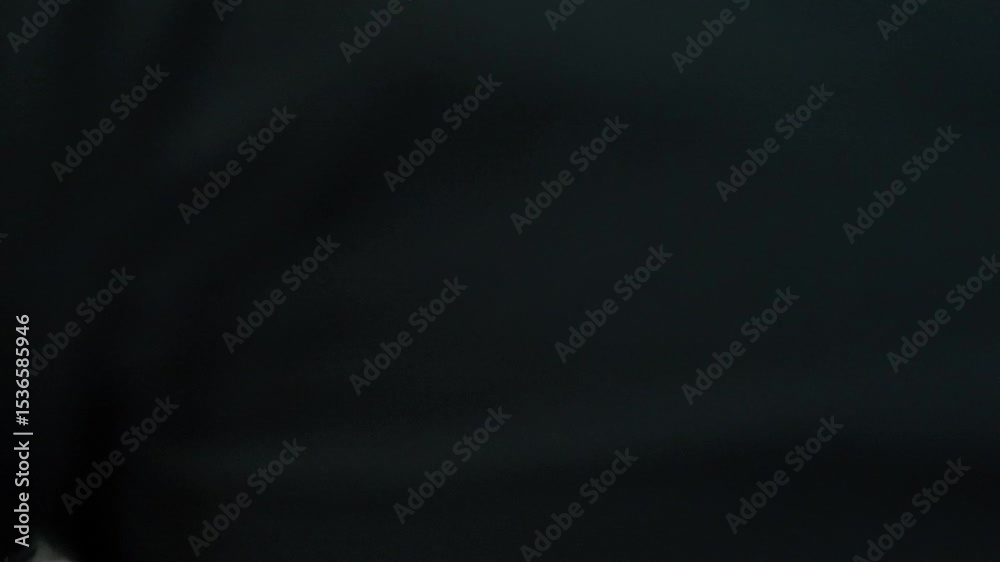 close up shot of internal metal component being aligned manually
