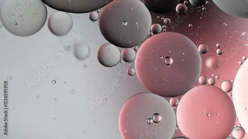Abstract Oil And Water Emulsion Creating Spheres And Globules In Soft Muted Pinks And Greys