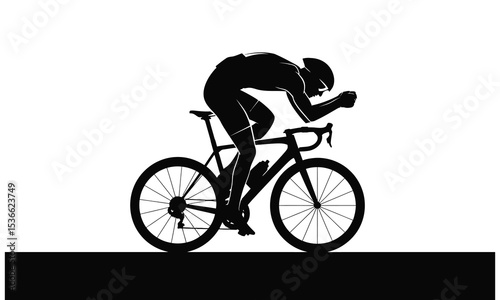 Silhouette of cyclist in racing position on road bike