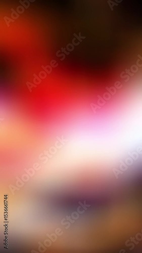 Abstract blurred gradient of red orange and white, suitable for backgrounds, banners, and digital designs needing a warm color palette.