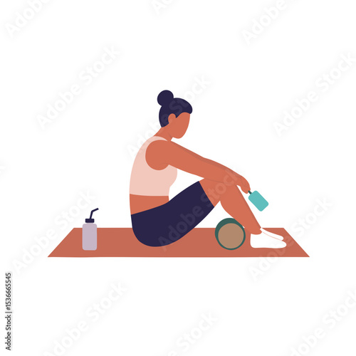 Young woman sitting on exercise mat with foam roller and water bottle  