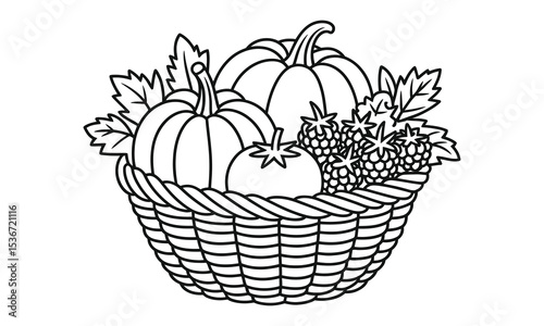 Autumn harvest basket with pumpkins raspberries and tomato