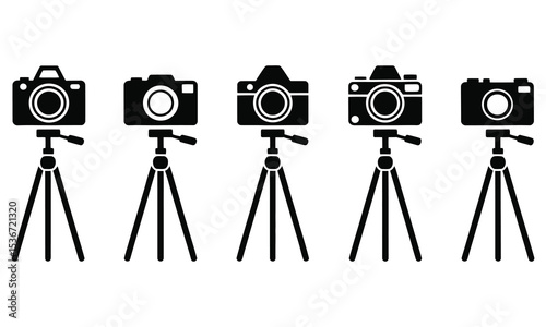 Five cameras mounted on tripods icon set