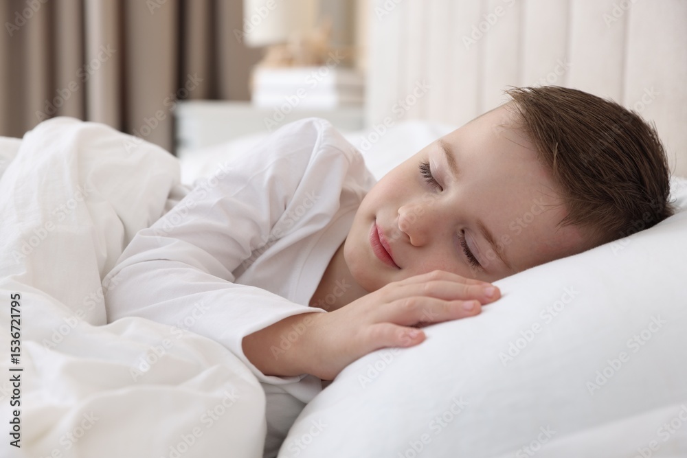Bedtime. Cute boy sleeping in comfortable bed Bedtime. Cute boy sleeping in comfortable bed