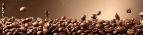 Freshly roasted coffee beans create rich, aromatic scene, showcasing their deep brown hues and glossy surfaces, evoking warmth and comfort