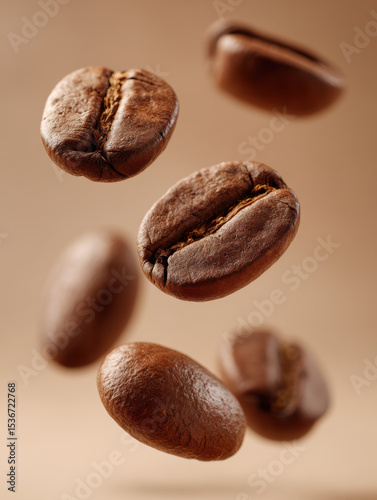 Floating coffee beans create captivating visual, showcasing their rich texture and deep brown color against soft background