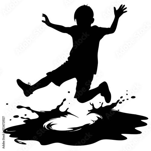 Child jumping into a puddle creating splashes during a sunny day in a playground