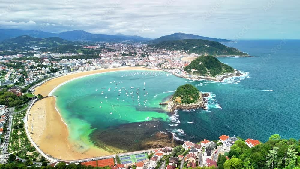 A breathtaking aerial scene that beautifully showcases La Concha Beach along with its stunning turquoise waters