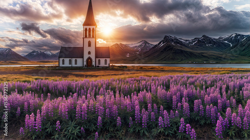 A serene church stands amidst a field of vibrant purple lupines, bathed in the golden light of a stunning sunset.