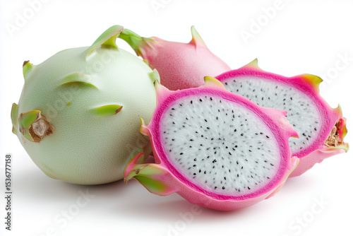 Dragon fruit showcases its vibrant pink skin and speckled white flesh, revealing its unique interior. This exotic fruit is ready to be enjoyed as a healthy snack