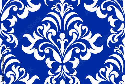 Elegant Damask Seamless Pattern White Floral Design on Deep Blue Background
