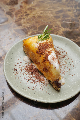Marshmallow and chocolate cake on table