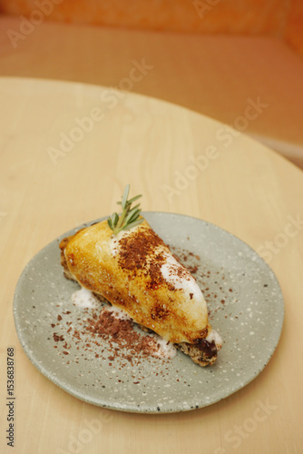 Marshmallow and chocolate cake on wooden table