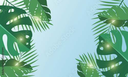 frame with green tropical leaves
