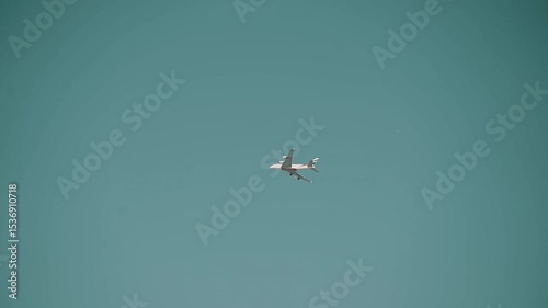 airplane flies in the sky travel around the world. Air transport sunny bright day high above the city
