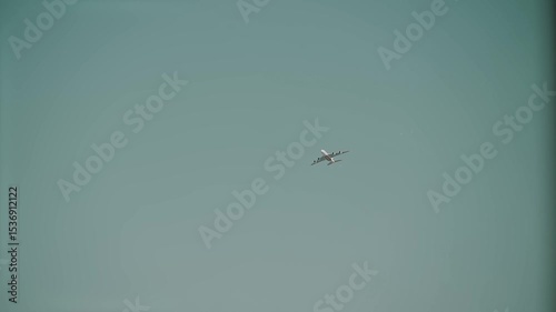 airplane flies in the sky travel around the world. Air transport sunny bright day high above the city