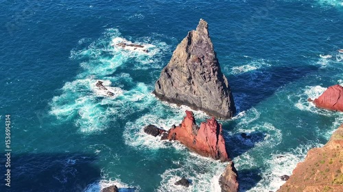 Exploring the stunning coastal rock formations of Madeira during a sunny afternoon by the sea