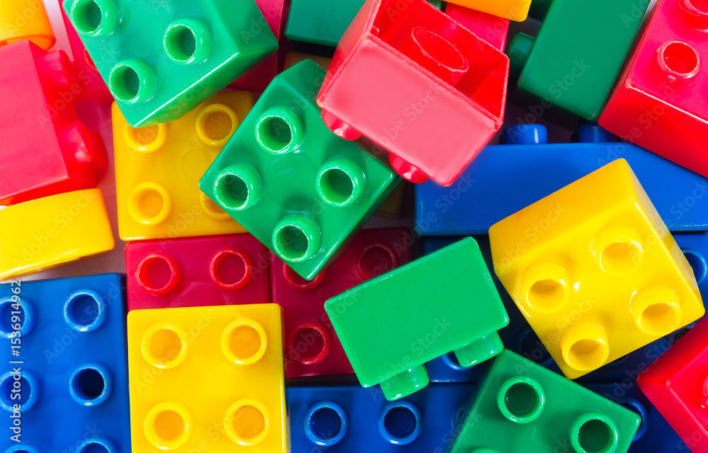 Fototapeta premium Close up photo of colorful construction block toy parts.