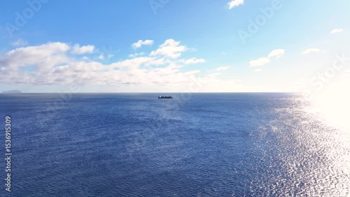 Breathtaking views of Madeiras endless ocean and tranquil skies on a clear day near the coastline