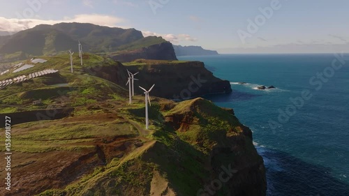 Discover breathtaking Madeiras coastline with wind turbines and scenic beauty along the edge of the Atlantic Ocean