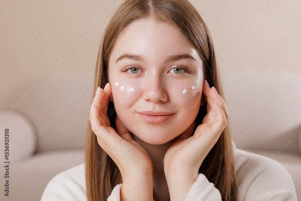 Woman applies moisturizer under eyes, skincare, hydration, beauty, healthy skin, facial care, routine, wellness, selfcare. Woman applies moisturizer under eyes, skincare, hydration, beauty, healthy skin, facial care, routine, wellness, selfcare.
