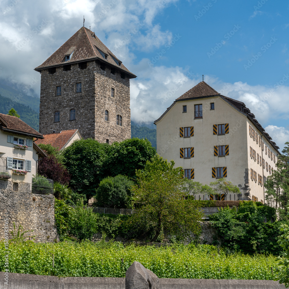 Fototapeta premium view of the historic village center of Maienfeld village with medieval Brandis Castle