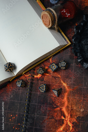 Top-down view of a tabletop RPG setup with dice, miniatures, character sheets, a dice tower, and a fantasy map. Perfect for DnD, strategy games, or role-playing visuals.