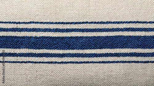 Selvedge denim canvas background with indigo warp threads on ecru weft, classic American workwear material.