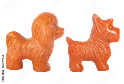 Isolated photo of soviet rubber dog toy figurines on white background.