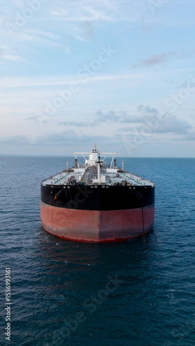Aerial view of the front of a large crude oil tanker ship at sea