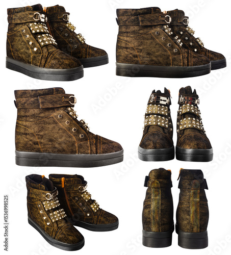 Isolated photo of brown suede leather woman rocker or punk boots on white background.