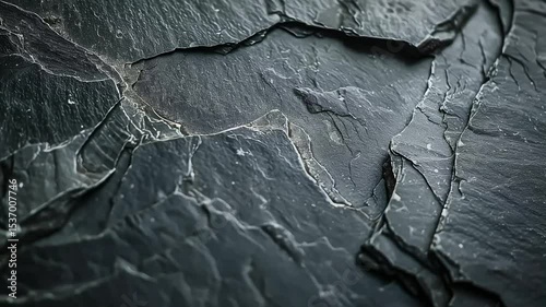 Horizontal slow motion video of black marble texture with sleek, glossy surface—luxurious and minimal background perfect for elegant design, contrast, or premium text placement.